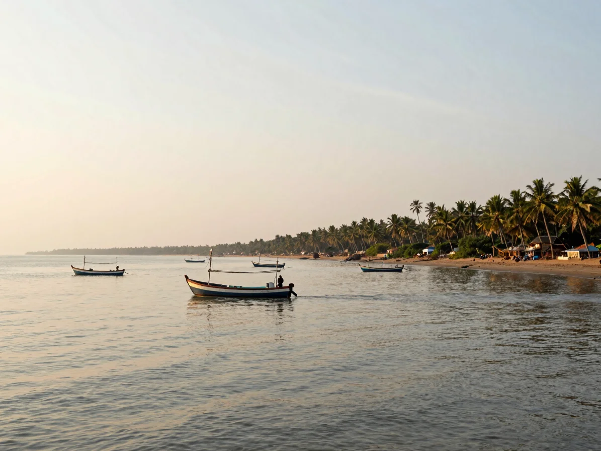 Editorial travel photograph of a quiet Konkan coastline at golden